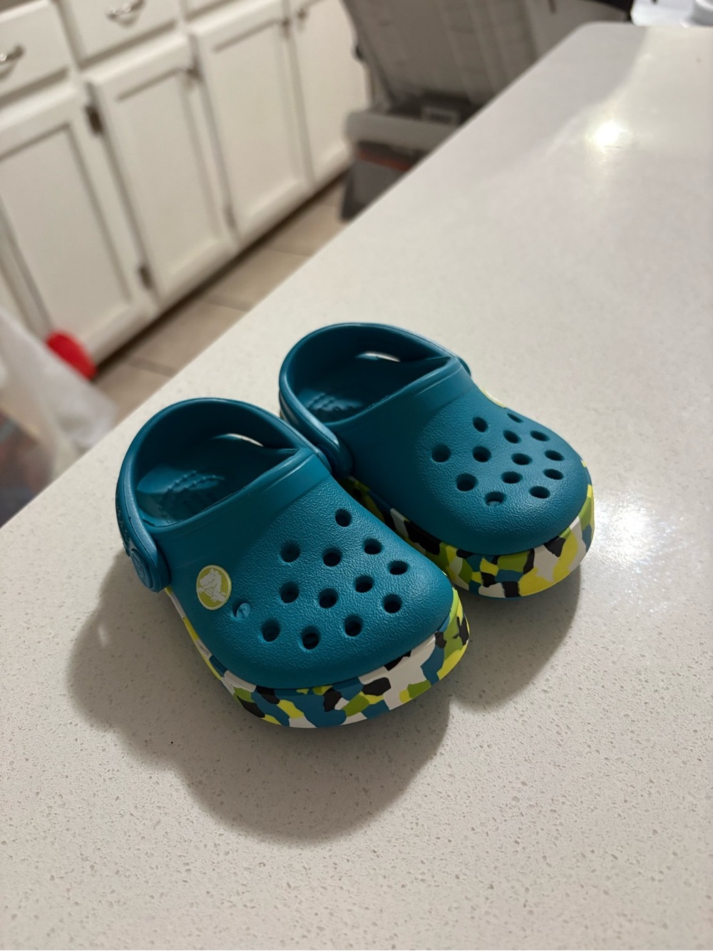 CROCS Kids Teal Clogs with Multicolor Camo Trim